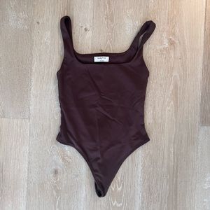 Babaton body suit size small, excellent condition